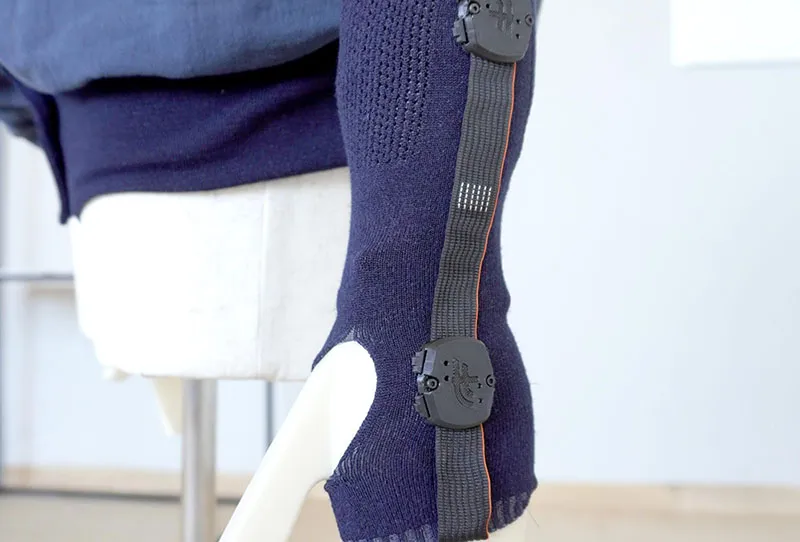 TheraTex — wearable textile sensing module integrated into upper-limb rehabilitation garment